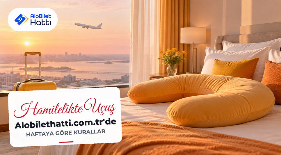 Otel odasında hafif bavul ve yastık