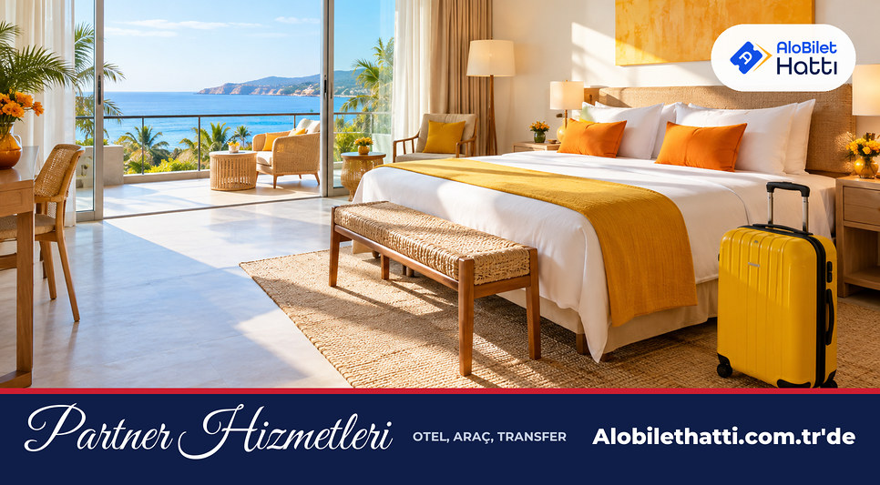 Otel odasında valiz ve deniz manzarası