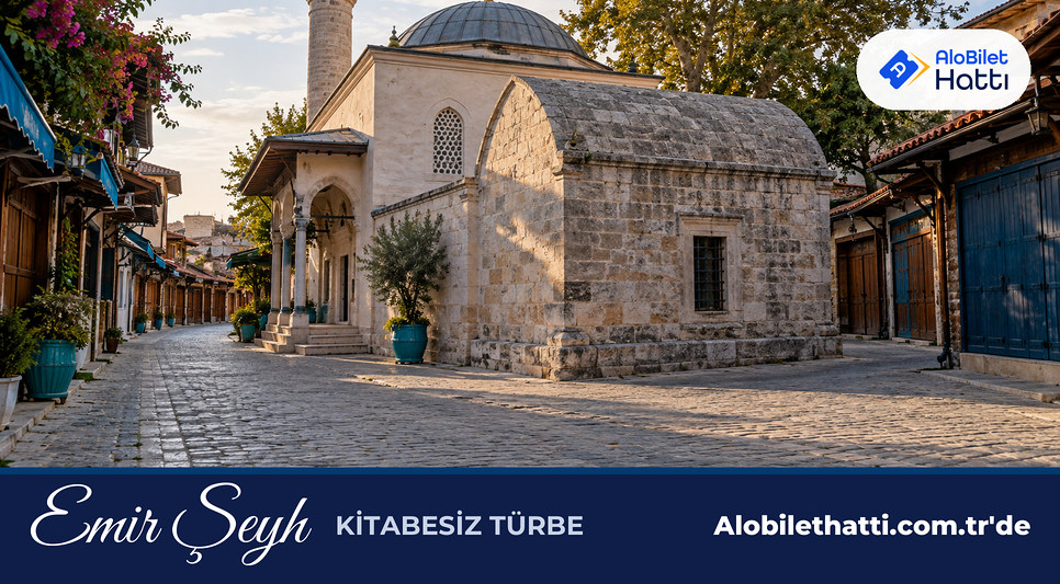 Çarşı sokağında küçük bir mescide bitişik kesme taş türbe