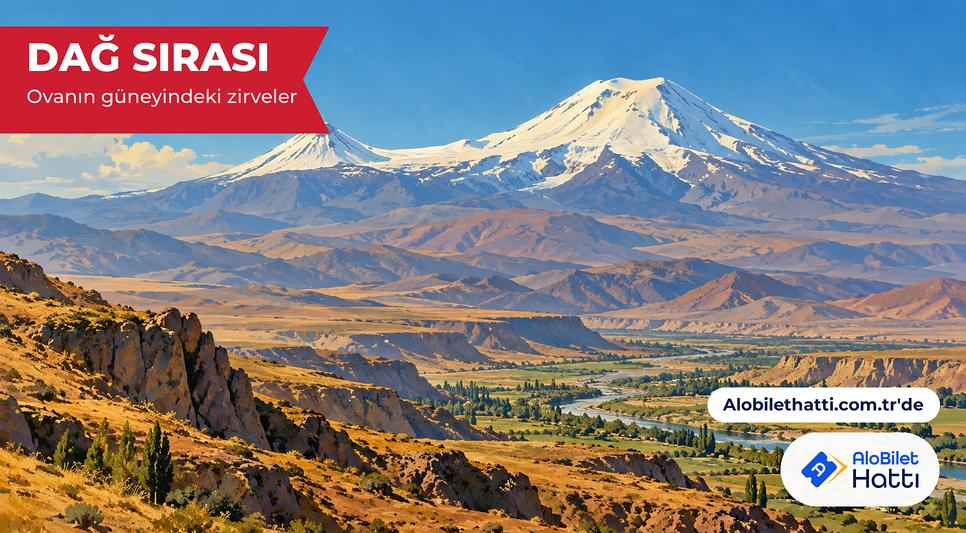 Kuru yamaçların ardında yükselen ve bir boyunla birleşen iki volkanik zirve